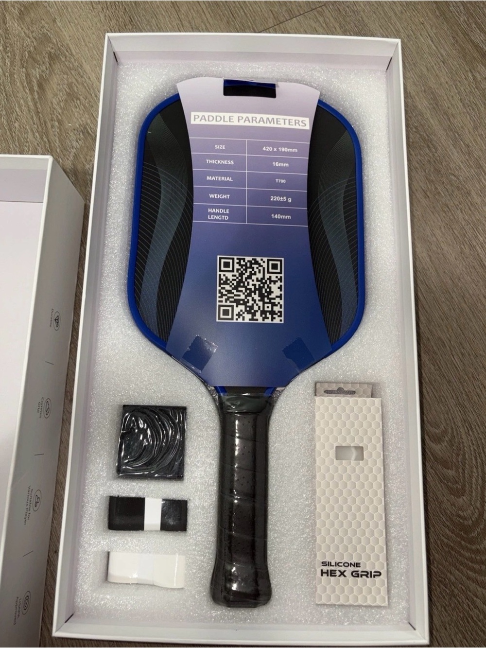 Blue and Black Pickleball Paddle with Grip Accessories